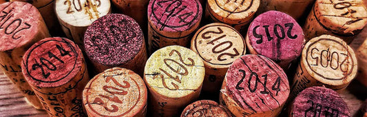 Upright corks with vintages on