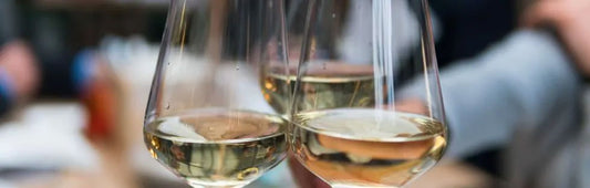 Three glasses of white wine